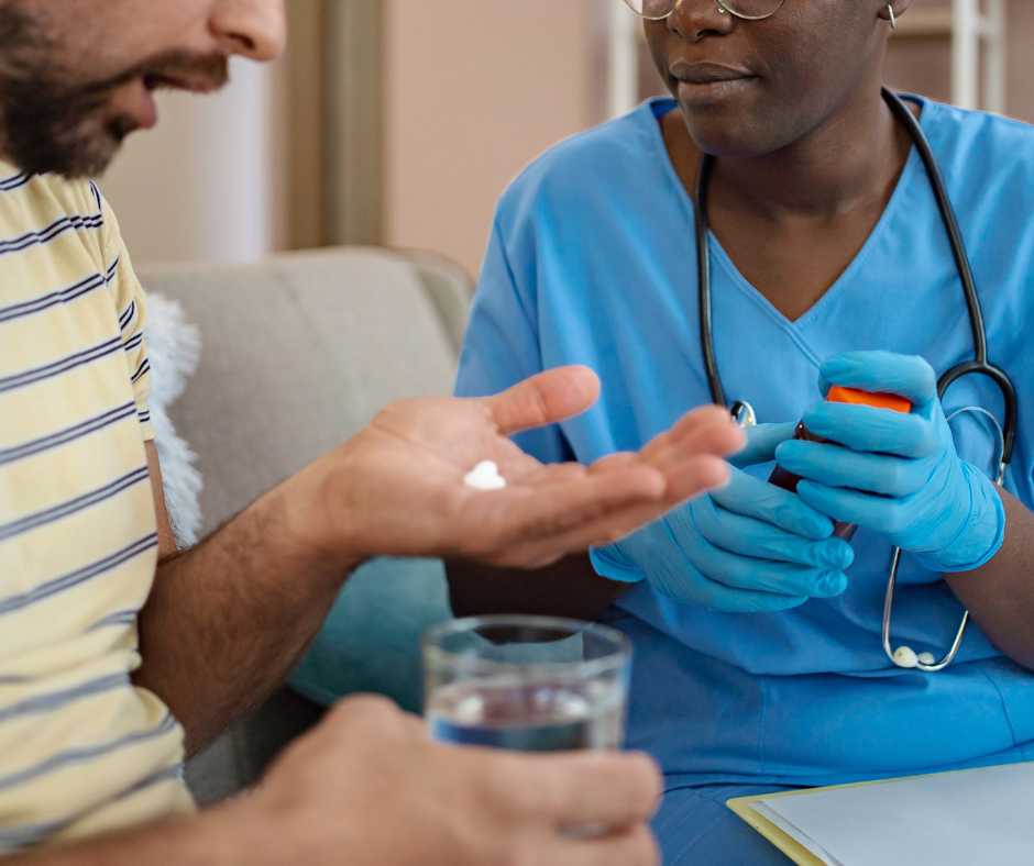 A trained nurse is assisting with a patient's medication management.